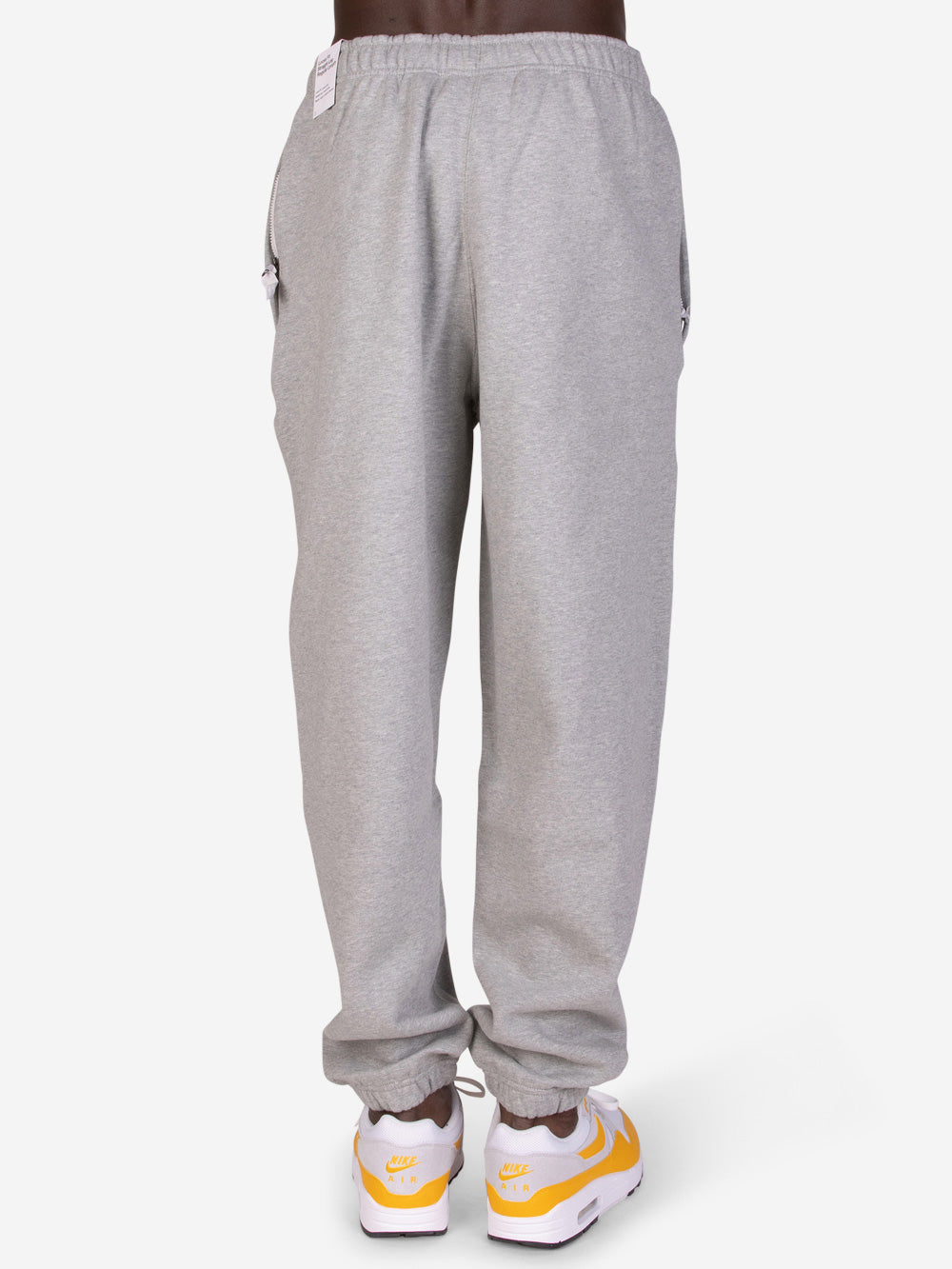 NIKE Pantaloni Solo Swoosh grigio Grigio Urbanstaroma