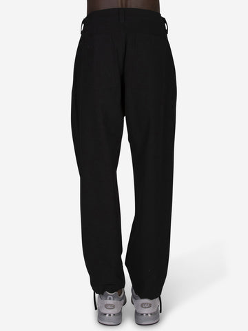 High-waisted pants with pleats