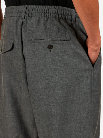 UNIVERSAL WORKS Pantaloni track grigi con plissettatura Melange